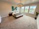 Spacious main bedroom with ample natural light and modern decor at 1732 Stable View Dr, Castle Pines, CO 80108