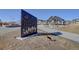 The Ramble Park sign, features metal cutout leaves and is next to a picnic pavillion at 1732 Stable View Dr, Castle Pines, CO 80108