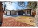 Charming single-Gathering home with landscaped yard, and a concrete driveway, set against a bright blue sky at 3691 S Joplin St, Aurora, CO 80013