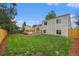 Spacious backyard featuring a wooden deck and well-maintained lawn at 11510 Otis St, Westminster, CO 80020