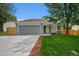 Charming single-Gathering home with well-maintained lawn, mature trees, and a two-car garage at 11510 Otis St, Westminster, CO 80020