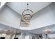 Elegant double-ring chandelier illuminating the two-story entryway at 444 N Jamestown Way, Aurora, CO 80018