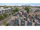 Aerial view features a residential neighborhood with rooftop patios offering outdoor seating and city views at 3522 W 17Th Ave, Denver, CO 80204