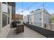 Cozy balcony features a grill and a relaxing atmosphere with a neighborhood view at 3522 W 17Th Ave, Denver, CO 80204