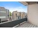 Relaxing balcony view with modern railings and the neighborhood in the background at 3522 W 17Th Ave, Denver, CO 80204