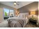 Serene bedroom with a sliding glass door, soft carpet, and neutral decor at 3522 W 17Th Ave, Denver, CO 80204