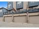 View of three attached garages, showcasing convenient and private parking for residents at 3522 W 17Th Ave, Denver, CO 80204
