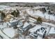 Snow-covered homes and landscape; community view at 1524 E Weldona Way, Superior, CO 80027