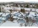 Two-story house in a snow-covered neighborhood at 1524 E Weldona Way, Superior, CO 80027