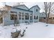 Home's back elevation and yard in winter at 1524 E Weldona Way, Superior, CO 80027