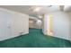 Finished basement with green carpet and extra room at 1524 E Weldona Way, Superior, CO 80027