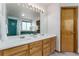 Bathroom with a double vanity and large mirror at 1524 E Weldona Way, Superior, CO 80027