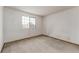 Simple carpeted bedroom with one window and neutral walls at 1524 E Weldona Way, Superior, CO 80027