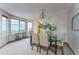 Bright dining room with a glass table and six chairs at 1524 E Weldona Way, Superior, CO 80027