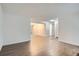 The spacious living room showcases the open floor plan and wood-look floors at 5300 E Cherry Creek South Dr # 217, Denver, CO 80246
