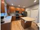 Spacious kitchen with stainless steel appliances, ample counter space, and a functional center island at 12196 Helena St, Commerce City, CO 80603