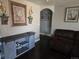 Comfortable living room featuring a stylish console and recliner, creating a cozy atmosphere at 1051 Jasper St, Aurora, CO 80011