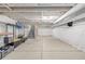 Unfinished basement features cement floors, exposed beams, and utility storage at 7752 Meade St, Westminster, CO 80030