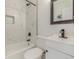 Modern bathroom with sleek fixtures, tiled shower, and updated vanity at 7752 Meade St, Westminster, CO 80030