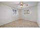 Bright bedroom with natural light, carpet floors and a ceiling fan at 8364 Allison Ct, Arvada, CO 80005