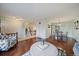 Inviting living room with hardwood floors and staircase to the upper level at 8364 Allison Ct, Arvada, CO 80005