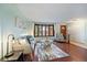 Cozy living room featuring a large bay window and hardwood floors at 8364 Allison Ct, Arvada, CO 80005