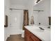 Bathroom featuring a shower/tub combo and plenty of counter space at 3601 E 103Rd Cir # B11, Thornton, CO 80229