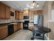 Well-equipped kitchen with stainless steel refrigerator and plenty of cabinets at 3601 E 103Rd Cir # B11, Thornton, CO 80229