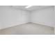 Clean, unfinished basement space with carpeting, and a light at 12780 Elm St, Thornton, CO 80241