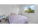 Charming bedroom with unicorn decor and a window with natural light at 12780 Elm St, Thornton, CO 80241