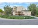 Charming two-story home with a two-car garage, a covered porch, and a well-maintained lawn and a split rail fence at 12780 Elm St, Thornton, CO 80241