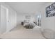 Bright, airy main bedroom with a balcony and stylish furniture at 12780 Elm St, Thornton, CO 80241