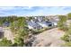 Picturesque aerial view of a neighborhood with homes nestled among mature trees and green spaces at 23742 E Calhoun Ave, Aurora, CO 80016