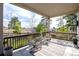 Relaxing back porch overlooking lush greenery and landscape with outdoor seating area at 23742 E Calhoun Ave, Aurora, CO 80016
