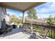 Inviting covered back porch offers a cozy spot for outdoor dining and relaxation at 23742 E Calhoun Ave, Aurora, CO 80016