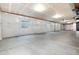 Large unfinished basement space with ample natural light from the multiple windows at 23742 E Calhoun Ave, Aurora, CO 80016