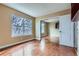 Bedroom with wood floors and a window for plenty of natural light at 9902 Independence St, Broomfield, CO 80021
