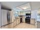 Well-equipped kitchen with stainless steel appliances, granite countertops, and ample cabinet space at 9902 Independence St, Broomfield, CO 80021