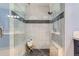 Modern shower with glass enclosure and decorative tile accents, perfect for relaxation at 9902 Independence St, Broomfield, CO 80021
