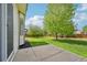 Backyard features patio, grass and wooden privacy fence at 3745 Balderas St, Brighton, CO 80601