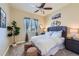 Comfortable bedroom with a tufted headboard, soft lighting, and stylish decor, creating a relaxing atmosphere at 3309 Thornwood Ct, Castle Rock, CO 80108