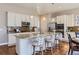 Well-lit kitchen featuring granite countertops, stainless steel appliances, and a breakfast bar with stool seating at 3309 Thornwood Ct, Castle Rock, CO 80108