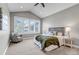 Cozy bedroom with neutral carpet, vaulted ceiling, and a large window at 11494 Colony Loop, Parker, CO 80138