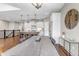 Bright dining area featuring stylish lighting and seamless access to the modern kitchen at 11494 Colony Loop, Parker, CO 80138