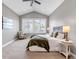 Serene main bedroom with vaulted ceiling and shuttered windows for natural light at 11494 Colony Loop, Parker, CO 80138