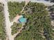 Aerial view of property showing house and surrounding woods at 28 Deer Rd, Evergreen, CO 80439
