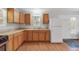 Bright kitchen featuring wood cabinets, stainless steel appliances, and light flooring at 28 Deer Rd, Evergreen, CO 80439