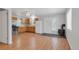 Small kitchen featuring wood cabinets and a wood-burning stove at 28 Deer Rd, Evergreen, CO 80439