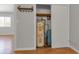 Utility closet with water heater and plumbing at 28 Deer Rd, Evergreen, CO 80439