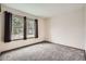This is an image of a bedroom with two windows at 6132 Terry Ct, Arvada, CO 80403